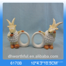 Elegant ceramic paper napkin ring with goat figurine